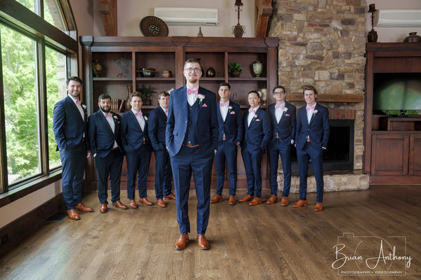Navy for the whole crew, groom out front
