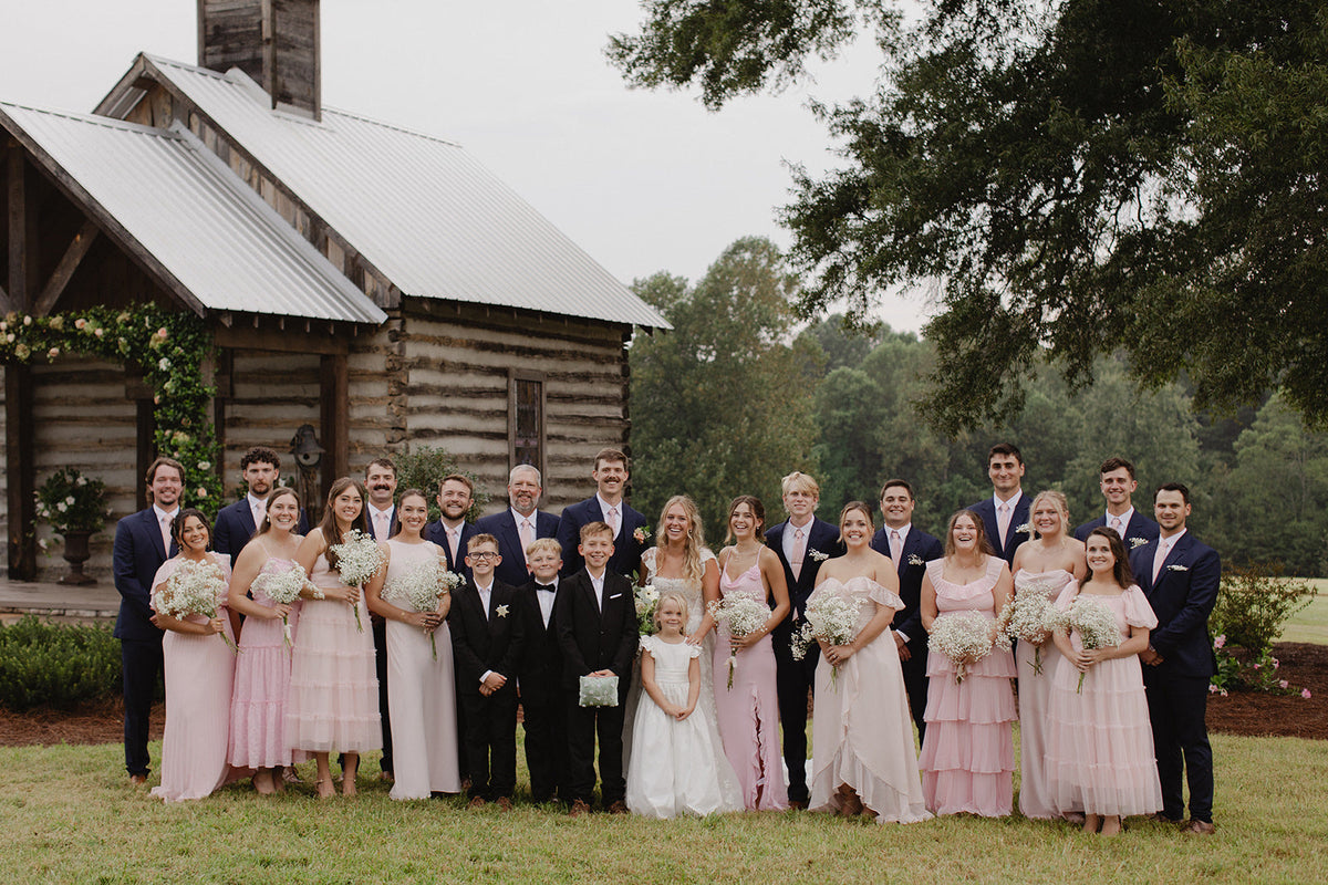 The whole party in navy — little suits for the little ones