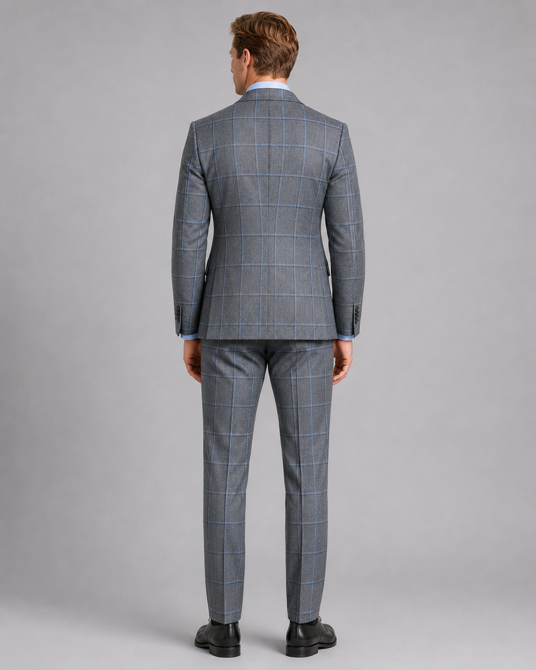 Back view of modern charcoal gray tailored sharkskin suit