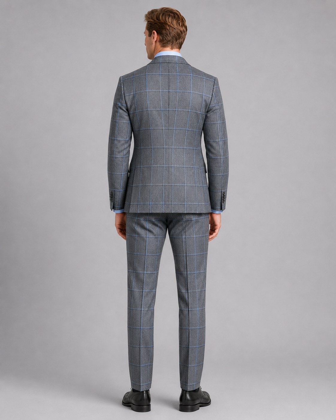 Back view of modern charcoal gray tailored sharkskin suit