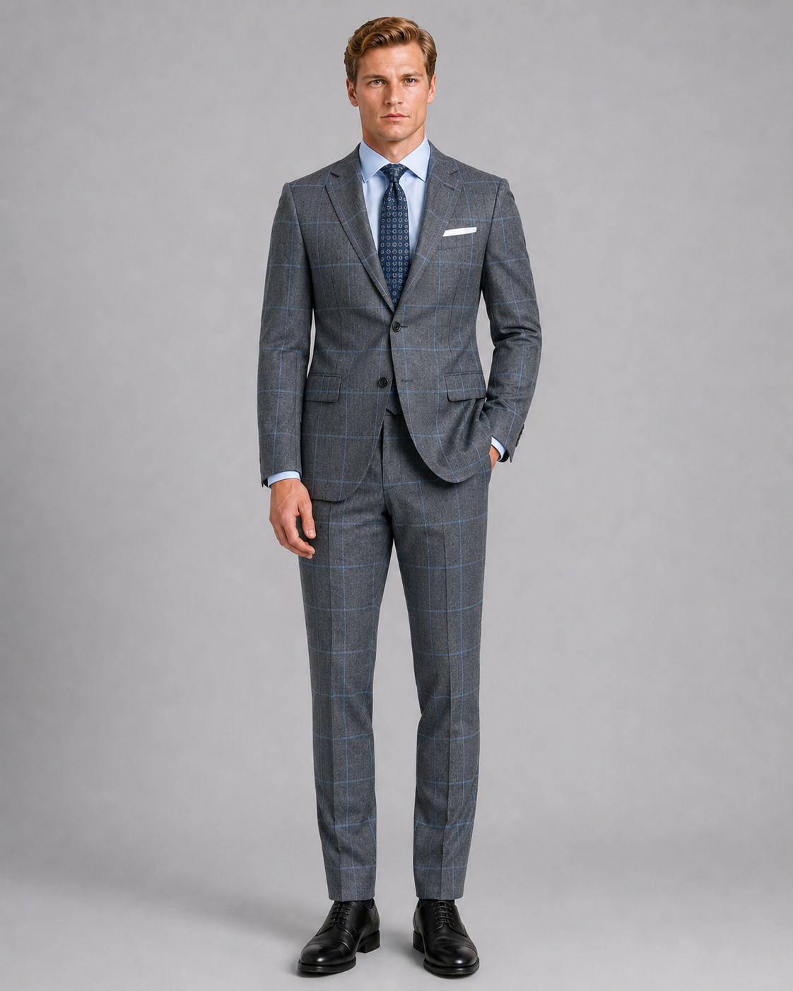 Front view of charcoal gray sharkskin windowpane tailored suit