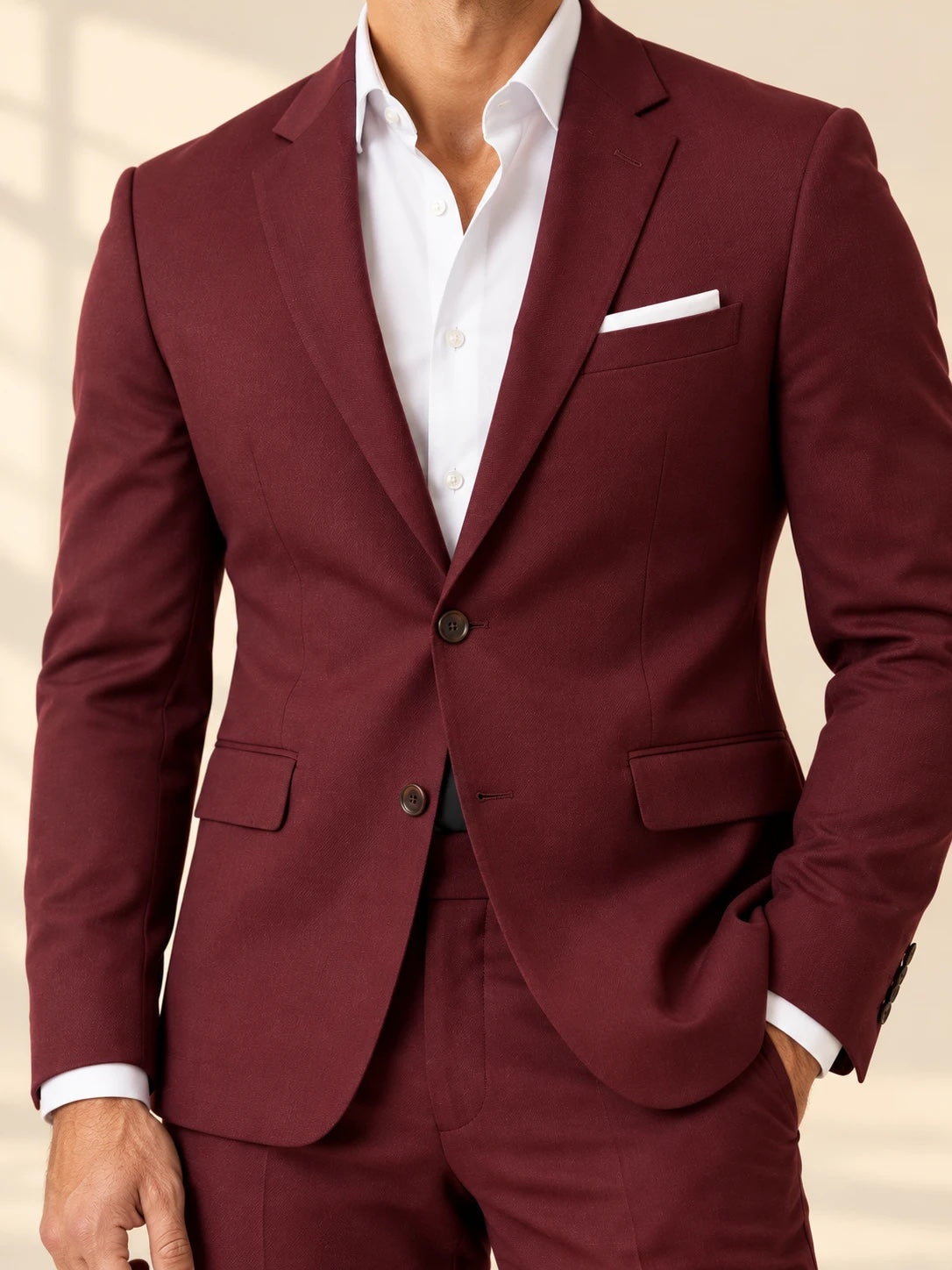 Burgundy suit close-up of lapel, buttons and fabric