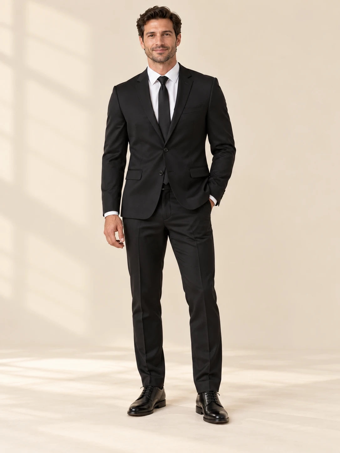 Black suit, front view, white shirt and black tie
