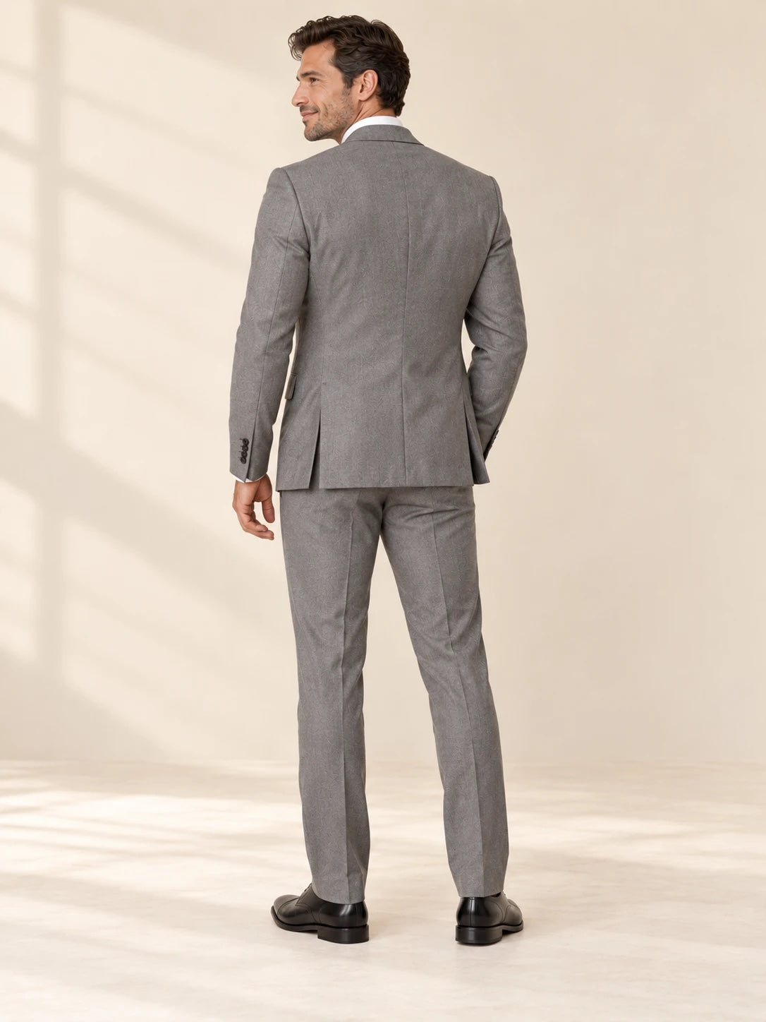 Gray suit, back view showing jacket fit