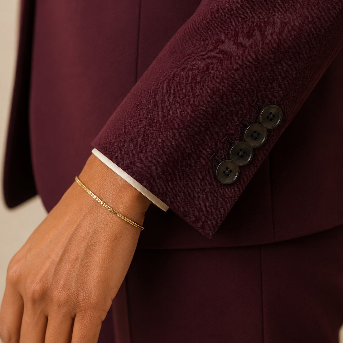 Burgundy cuff with horn buttons