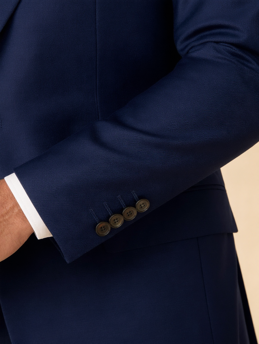 Close-up of the four-button cuff and jetted pocket
