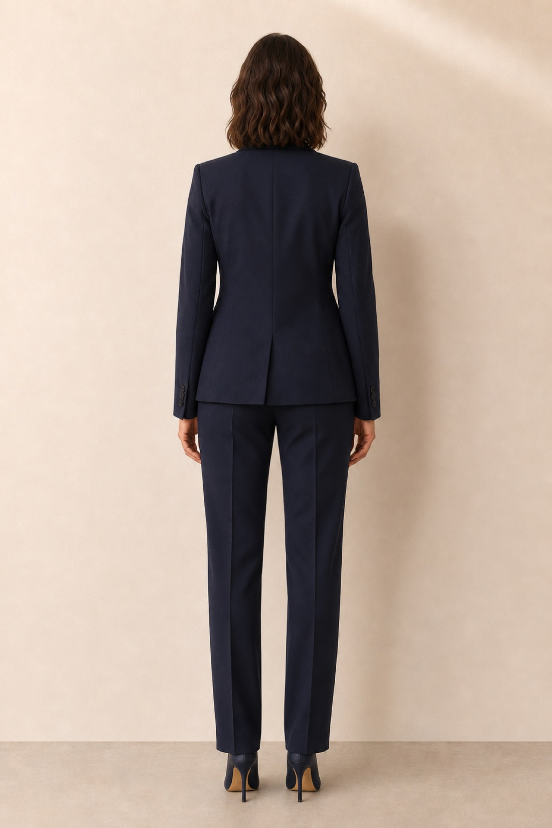 Navy women's pantsuit — back view