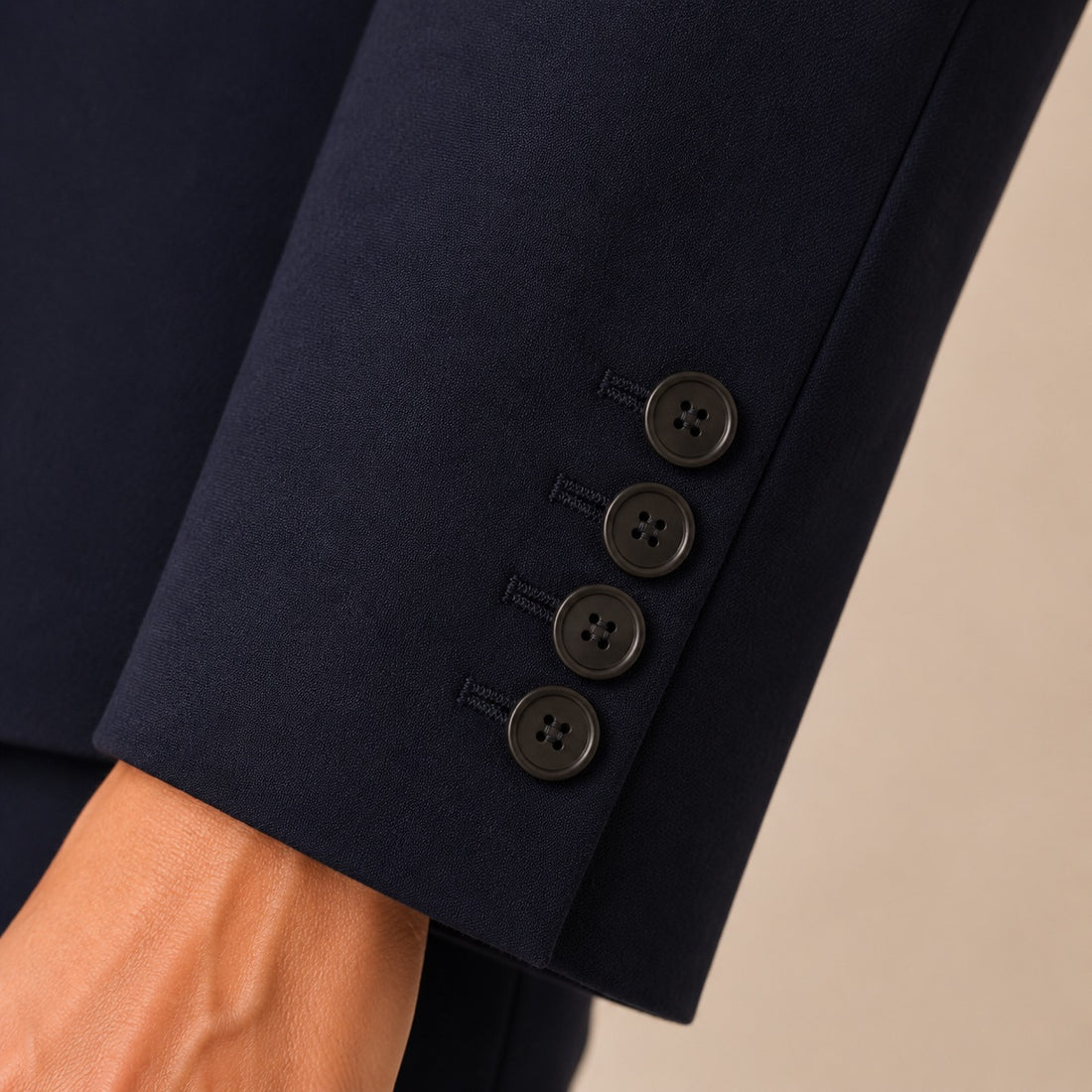 Four-button navy cuff detail