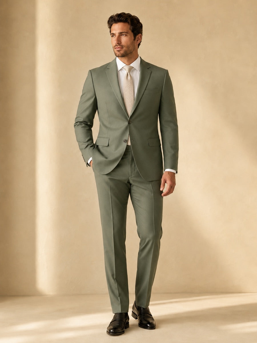 Model wearing a sage green suit